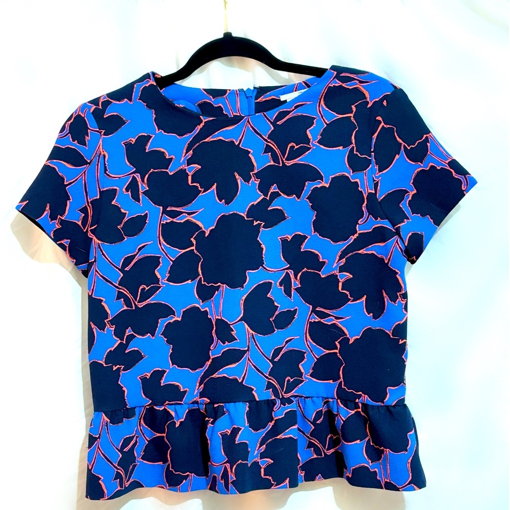 Beautiful Royal blue base color with a deep navy floral design outlined in coral